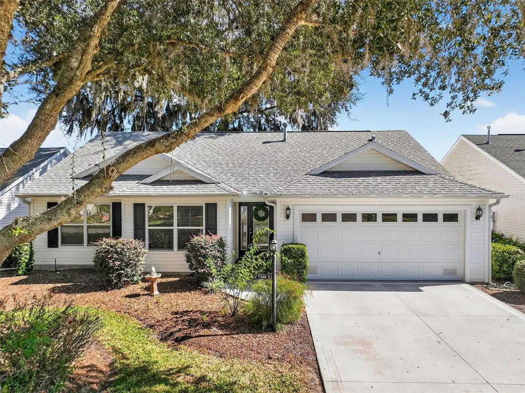 Property Slideshow image 1 of 38 | 7168 se 173rd arlington loop, The Villages, FL, 32162
