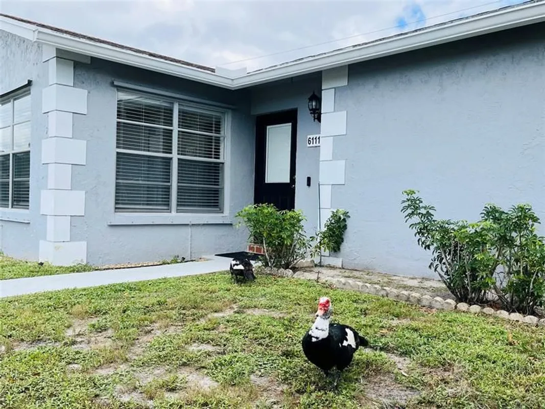 Property Slideshow image 1 of 20 | 6111 rainbow cir, Greenacres, FL, 33463