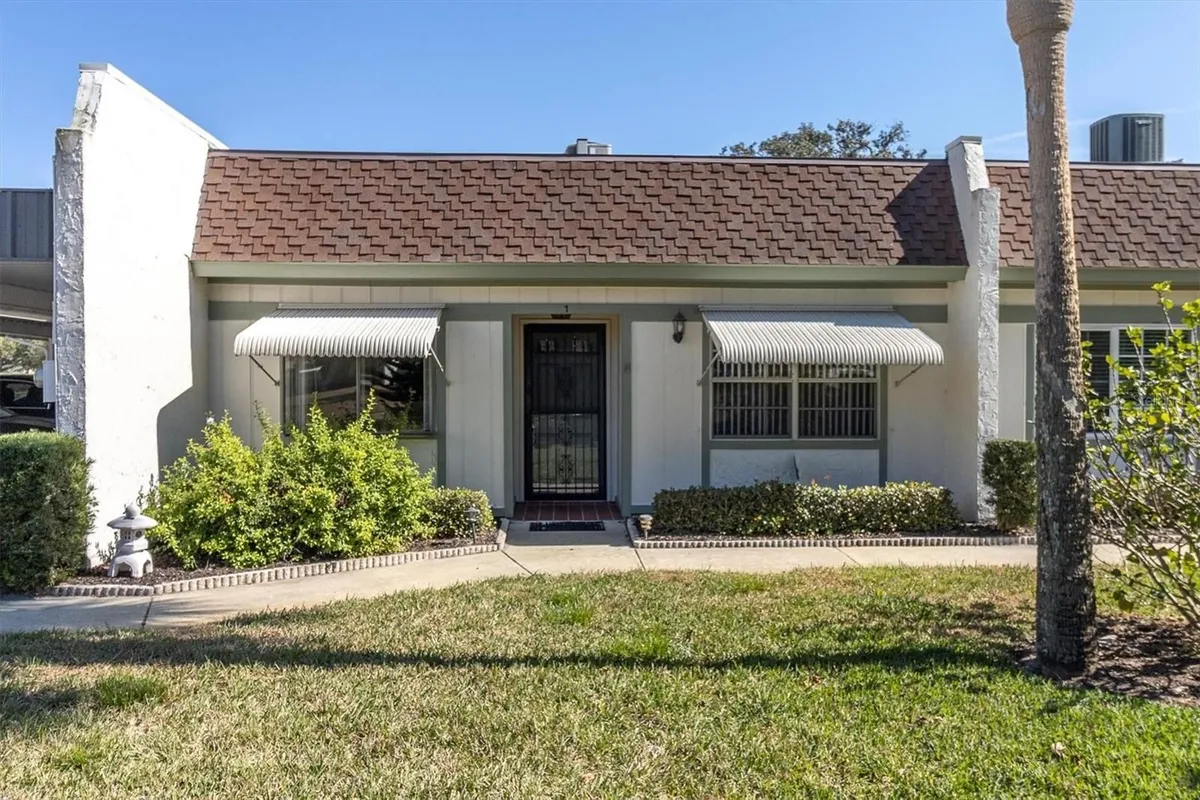 Property Slideshow image 1 of 63 | 11410 carriage hill dr 1, Port Richey, FL, 34668