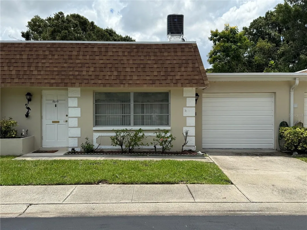 Property Slideshow image 1 of 42 | 8215 burgundy dr n # 8215, Pinellas Park, FL, 33781