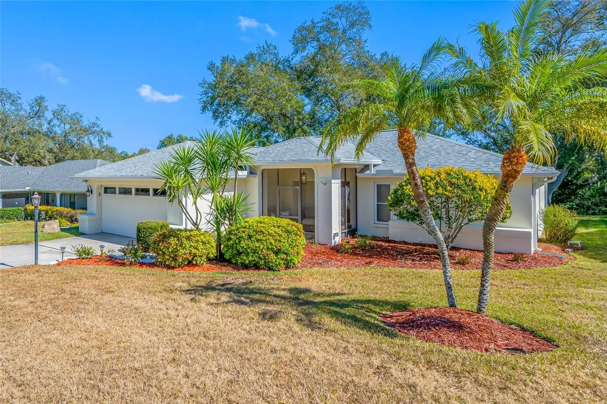 Property Slideshow image 1 of 48 | 1611 highland club ln, Palm Harbor, FL, 34684