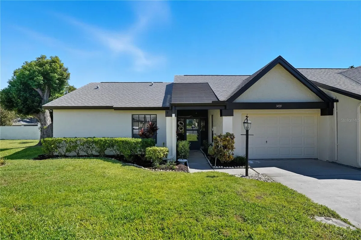 Property Slideshow image 1 of 31 | 3499 cedar ln, Palm Harbor, FL, 34684