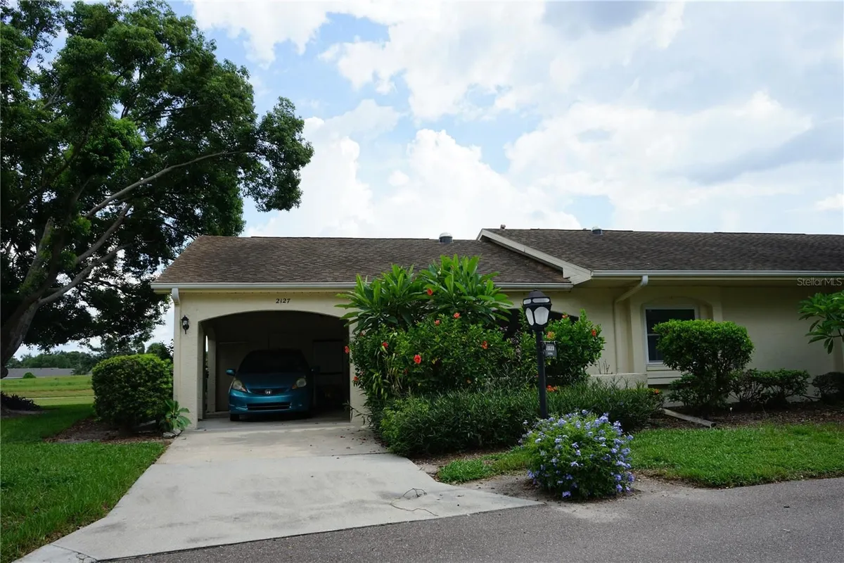 Property Slideshow image 1 of 61 | 2127 hailstone cir, Sun City Center, FL, 33573