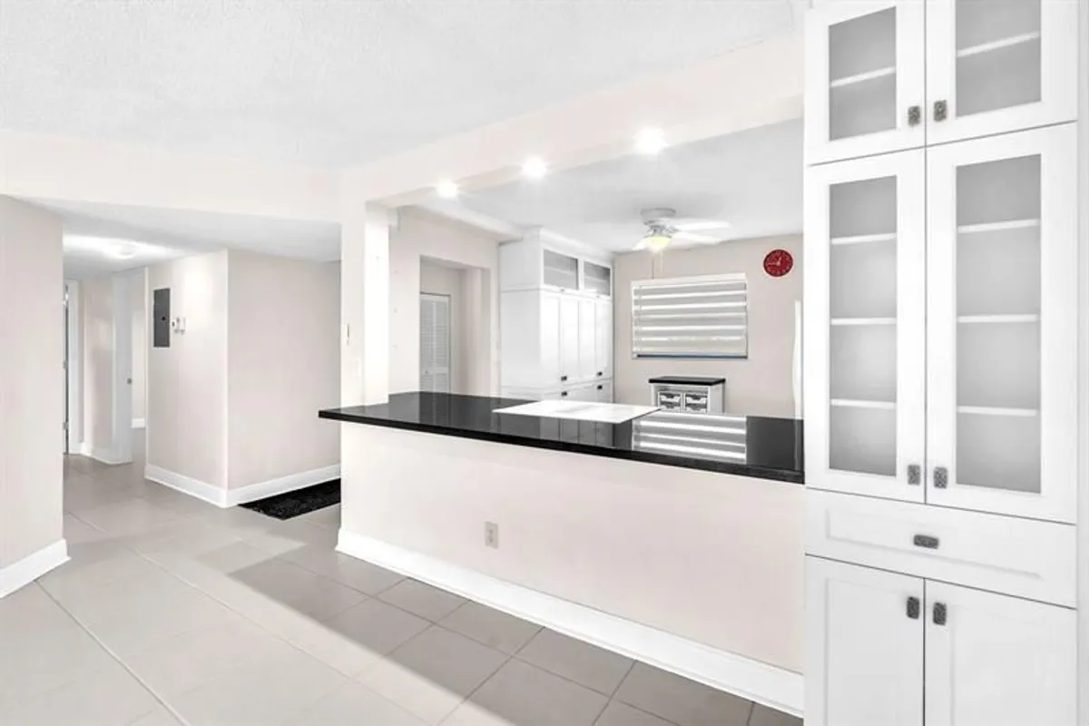 Property Slideshow image 1 of 26 | 4930 e sabal palm blvd 414, Tamarac, FL, 33319