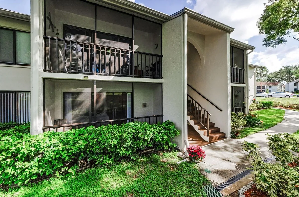 Property Slideshow image 1 of 31 | 2575 pine ridge way e1, Palm Harbor, FL, 34684