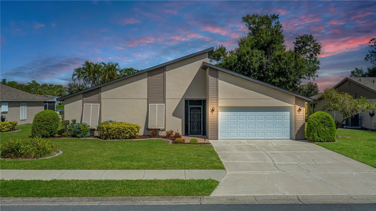 Property Slideshow image 1 of 58 | 425 cypress forest dr, Englewood, FL, 34223