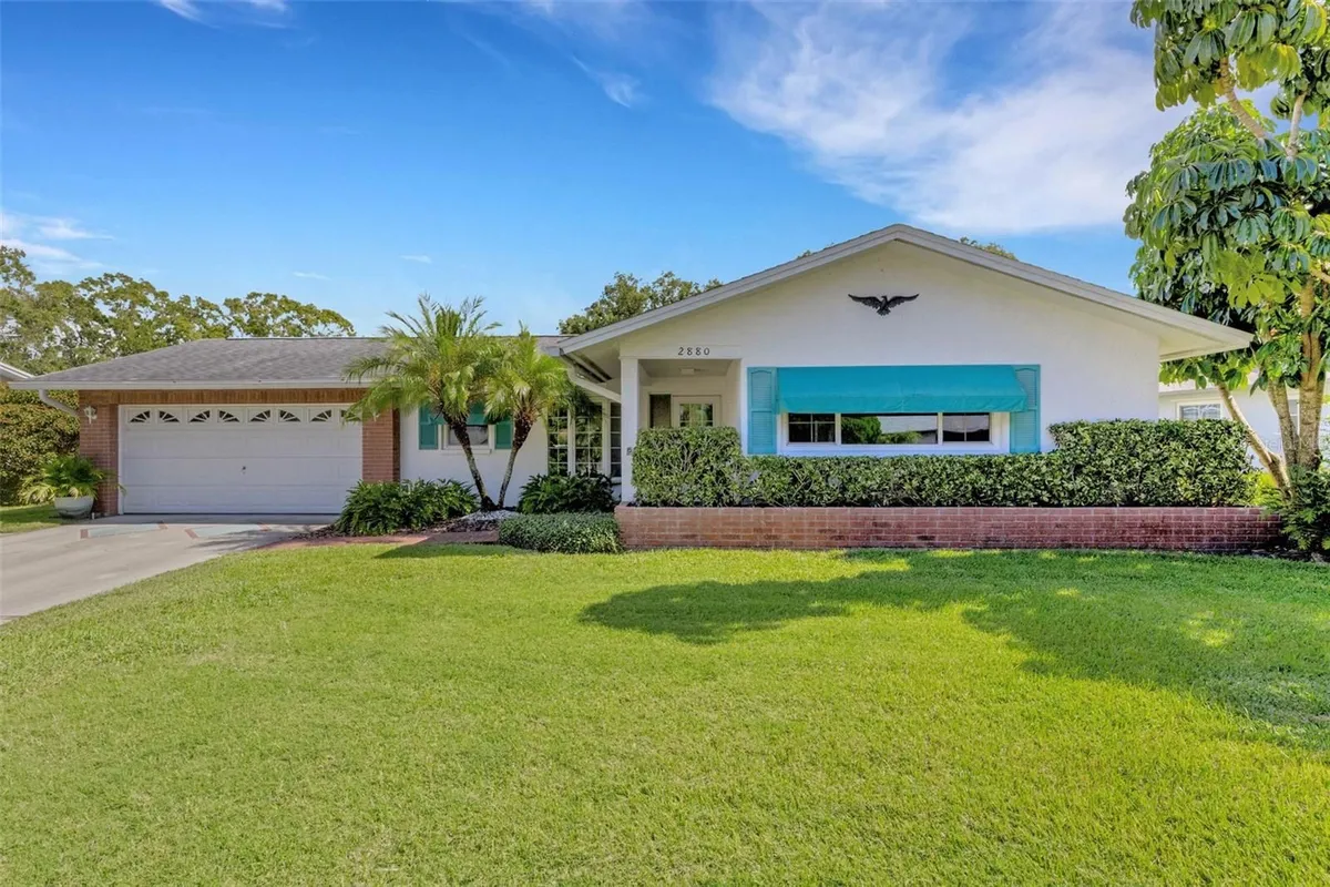 Property Slideshow image 1 of 96 | 2880 doone cir, Palm Harbor, FL, 34684