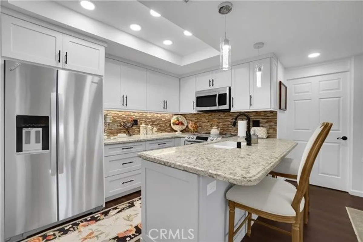 Property Slideshow image 1 of 13 | 1371 oakmont rd 150k, Seal Beach, CA, 90740