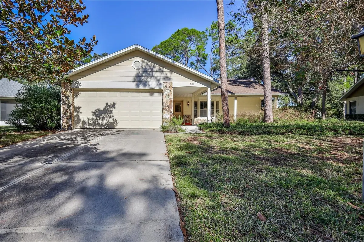 Property Slideshow image 1 of 73 | 2193 timber lodge ln, Spring Hill, FL, 34606