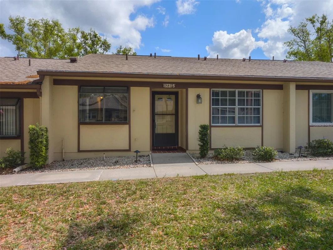 Property Slideshow image 1 of 58 | 11231 dollar lake dr 5, Port Richey, FL, 34668
