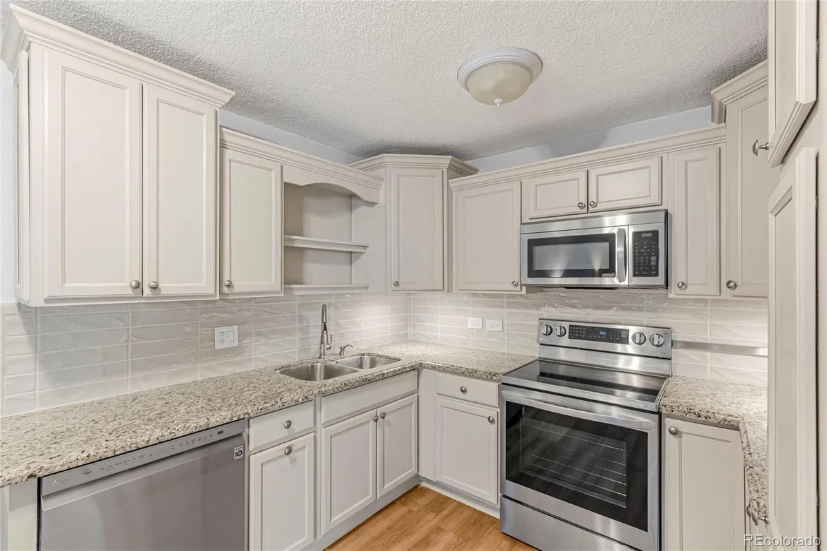 Property Slideshow image 1 of 30 | 9180 e center ave 5a, Denver, CO, 80247