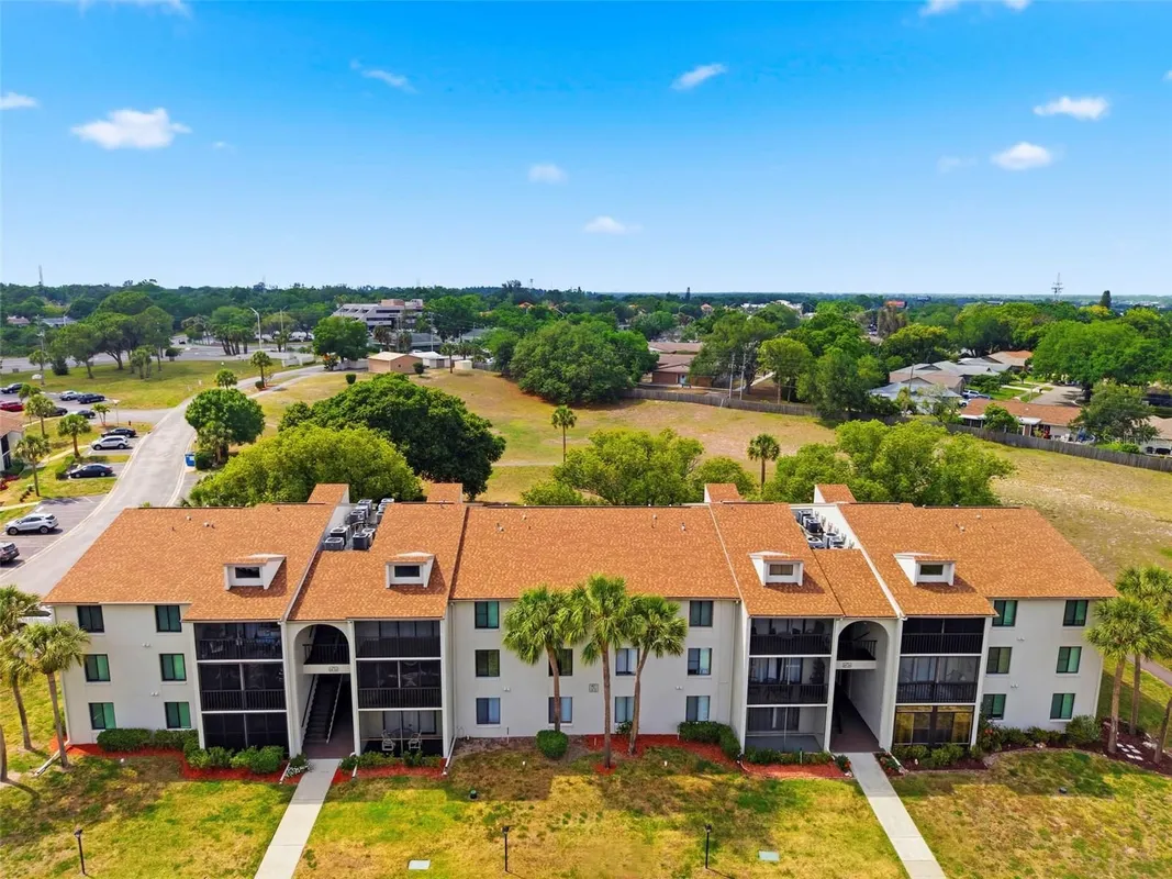 Property Slideshow image 1 of 60 | 1871 pine ridge way b2, Palm Harbor, FL, 34684