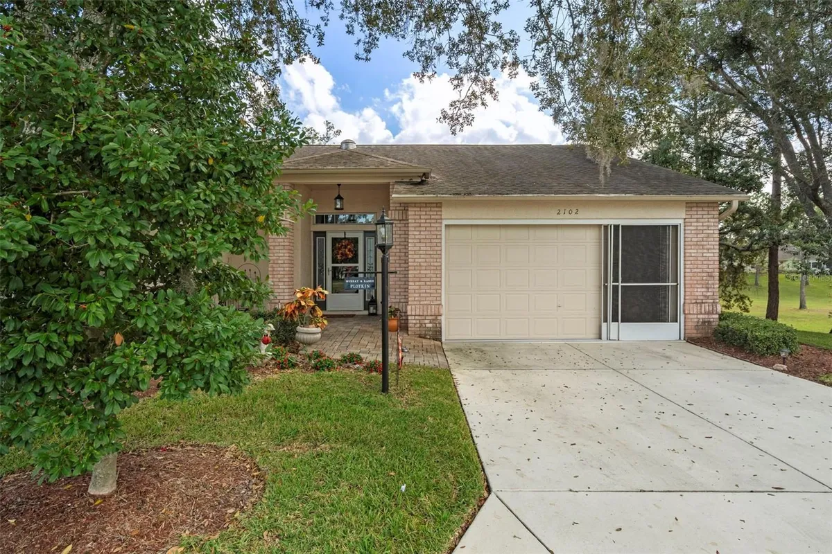 Property Slideshow image 1 of 41 | 2102 springmeadow dr, Spring Hill, FL, 34606
