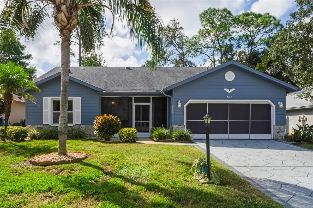Property Slideshow image 1 of 66 | 7112 green abbey way, Spring Hill, FL, 34606