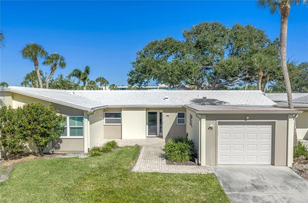 Property Slideshow image 1 of 60 | 111 whispering sands cir # v38, Sarasota, FL, 34242