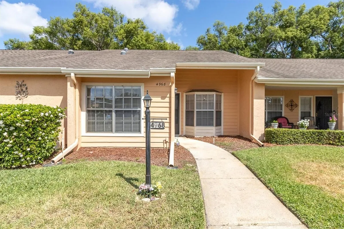 Property Slideshow image 1 of 54 | 4968 grist mill cir, New Port Richey, FL, 34655