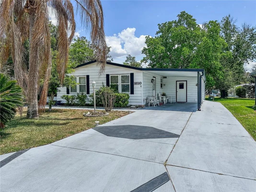 Property Slideshow image 1 of 12 | 1820 w schwartz blvd 8, Lady Lake, FL, 32159
