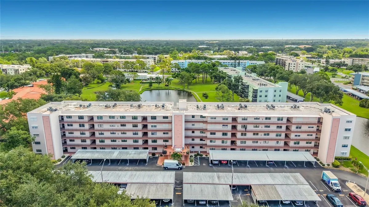 Property Slideshow image 1 of 58 | 8174 terrace garden dr 207, St Petersburg, FL, 33709