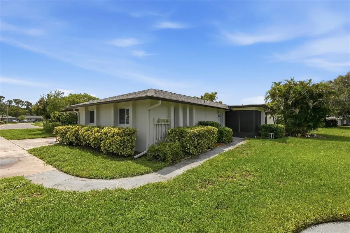Property Slideshow image 1 of 27 | 1339 queen anne dr c, Palm Harbor, FL, 34684