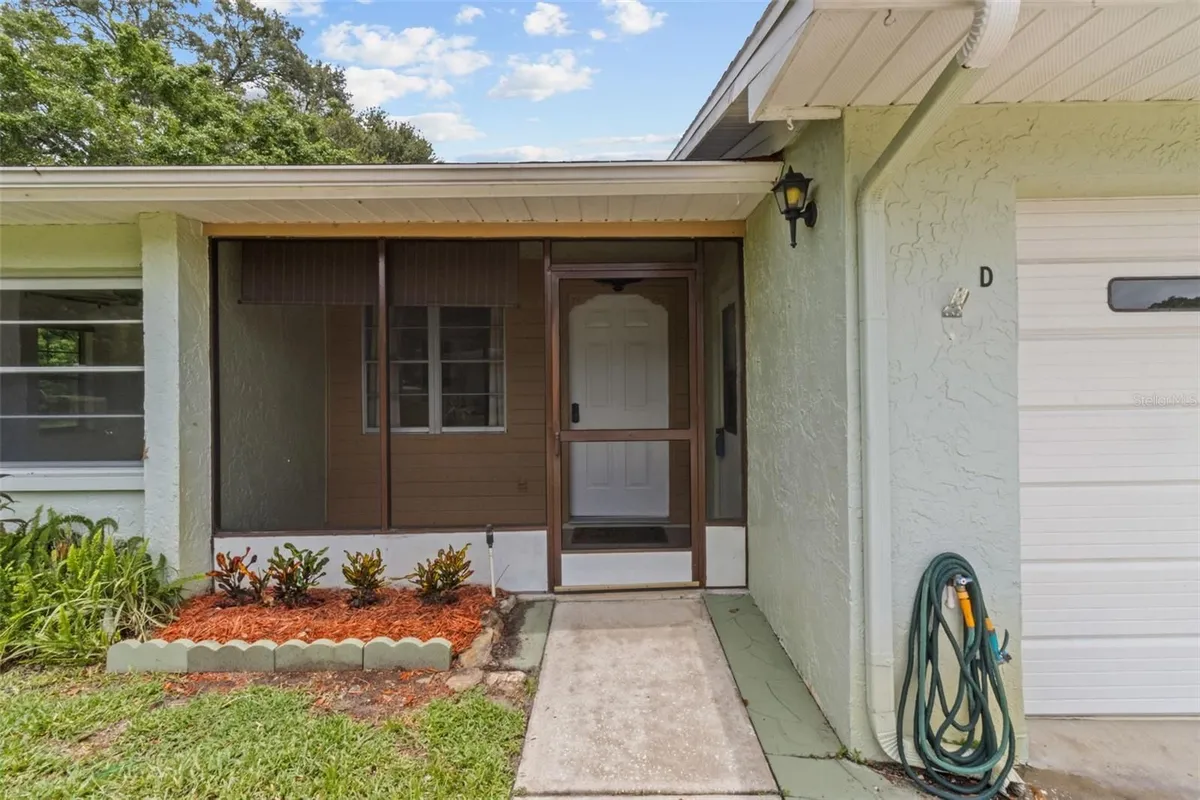 Property Slideshow image 1 of 36 | 1163 orange tree cir d, Palm Harbor, FL, 34684