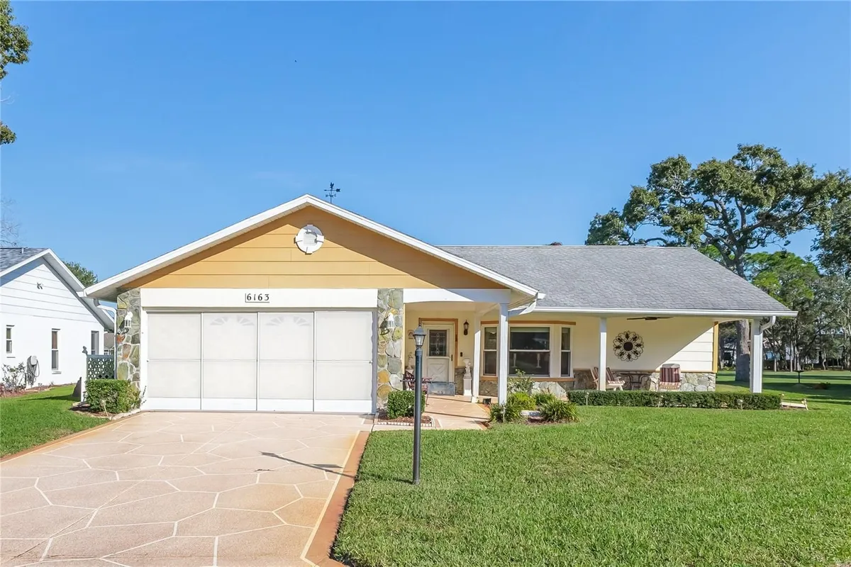 Property Slideshow image 1 of 73 | 6163 spyglass ct, Spring Hill, FL, 34606