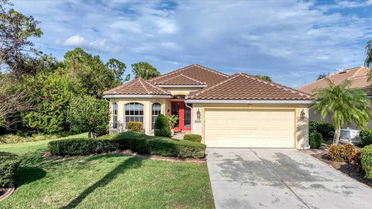 Property Slideshow image 1 of 75 | 3951 whispering oaks dr, North Port, FL, 34287